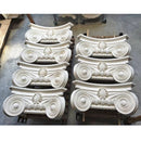 A batch of plaster Modern Empire plaster pilaster capitals ready to be packaged